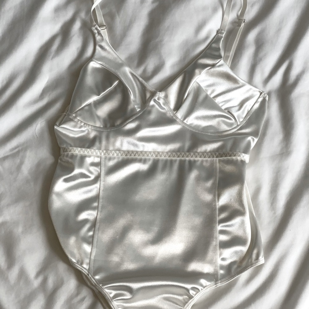 White silk bodysuit